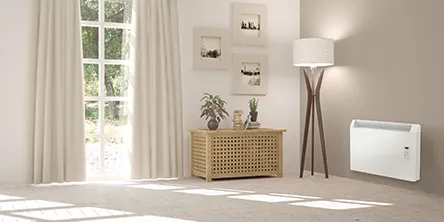 A beige room with an Elnur PH Plus Panel Heater on the wall